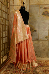 Peach Banarasi Katan silk Saree with golden Jari Butti all over and broad Jari boarder